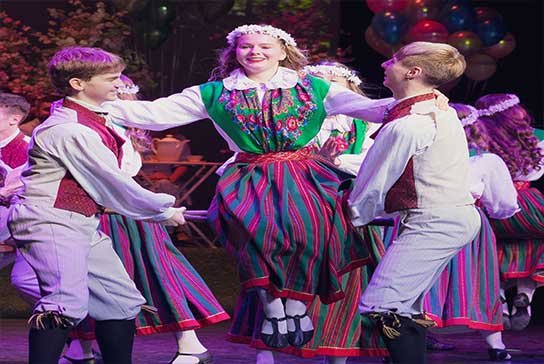 Members of Estonian Dance Ensemble SÕLEKE in traditional Estonian folk costumes at IEFF Vietnam 2026